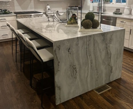 Elegant white and grey creamy stone countertop for kitchen island in Raleig, NC.
